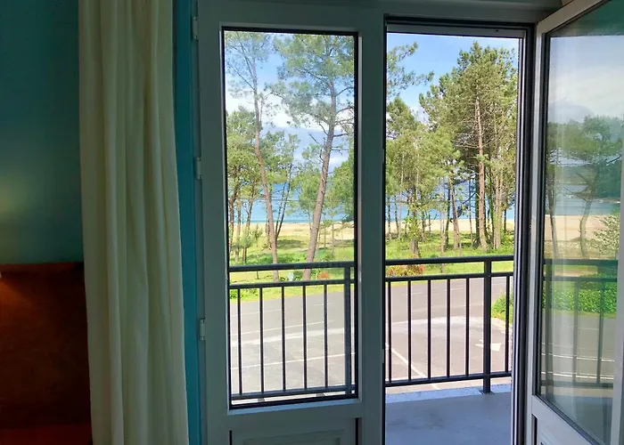 Playa De * Мерехо