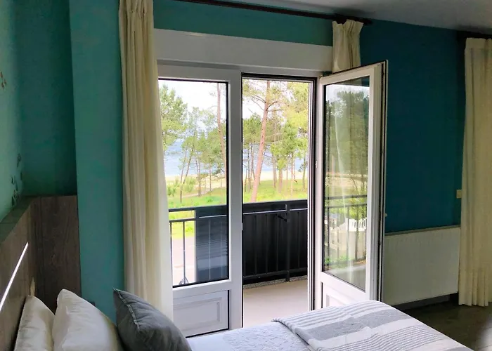 Playa De * Мерехо